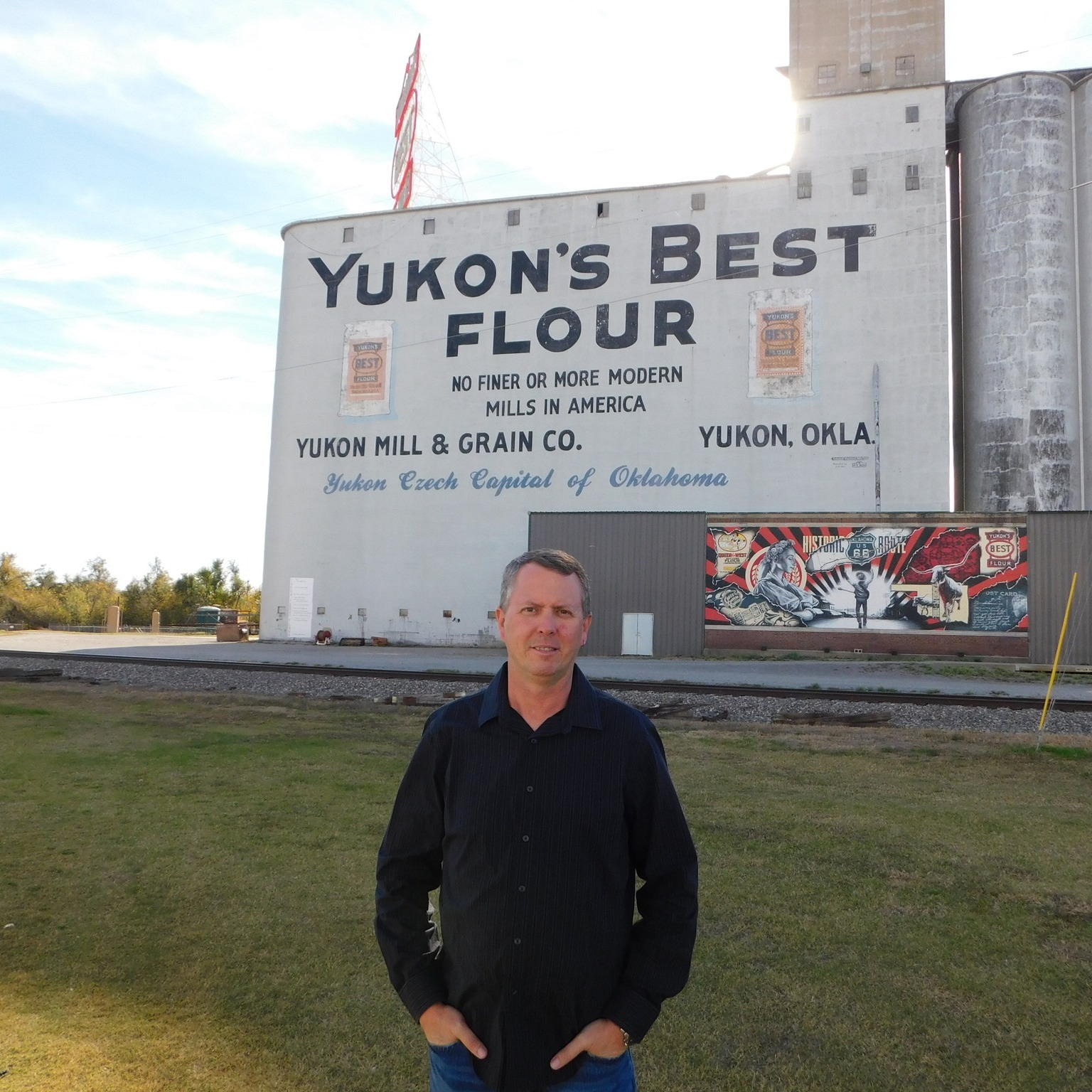 Rodney Zimmerman in front of the historic Yukon's Best Flour mill, a Route 66 landmark